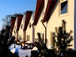 Holiday Village Tatralandia - Romantyczna Osada<p>W Tatralandii zamieszkacie nie w klasycznym hotelu czy pensjonacie, a w klimatycznych domkach. <p>